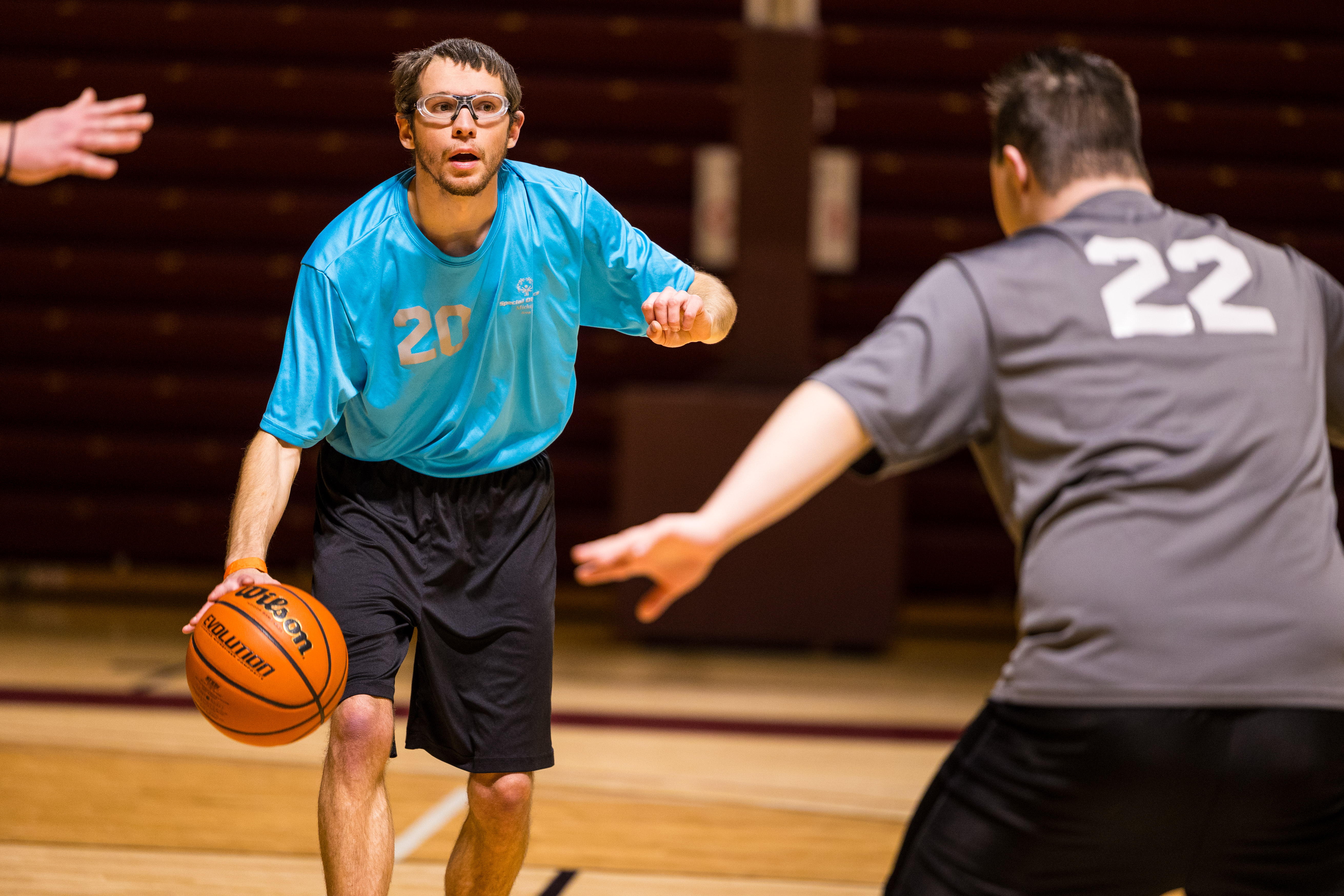 athletes playing basketball