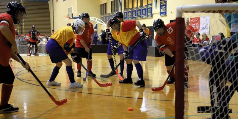 Athletes compete in Poly Hockey at the State Finals.