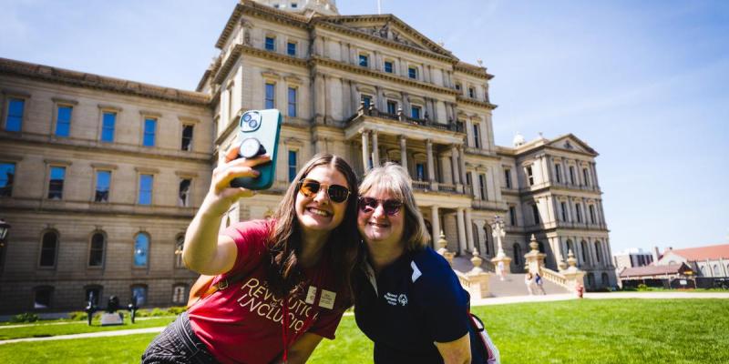 Posing for a picture outside the state Capitol